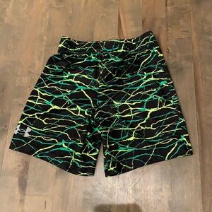 Under Armor green shorts, size 4